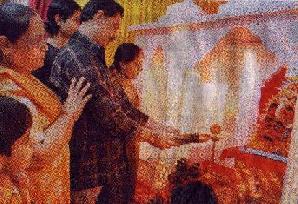 Picture of a pagan family, the Kalsis, performing 'Aarti' upon an idol of the demon Ganapati