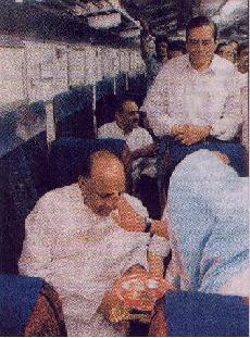 Indian politician Sharad Pawar being marked with the Tilak which is the last part of the 'Aarti' ceremony